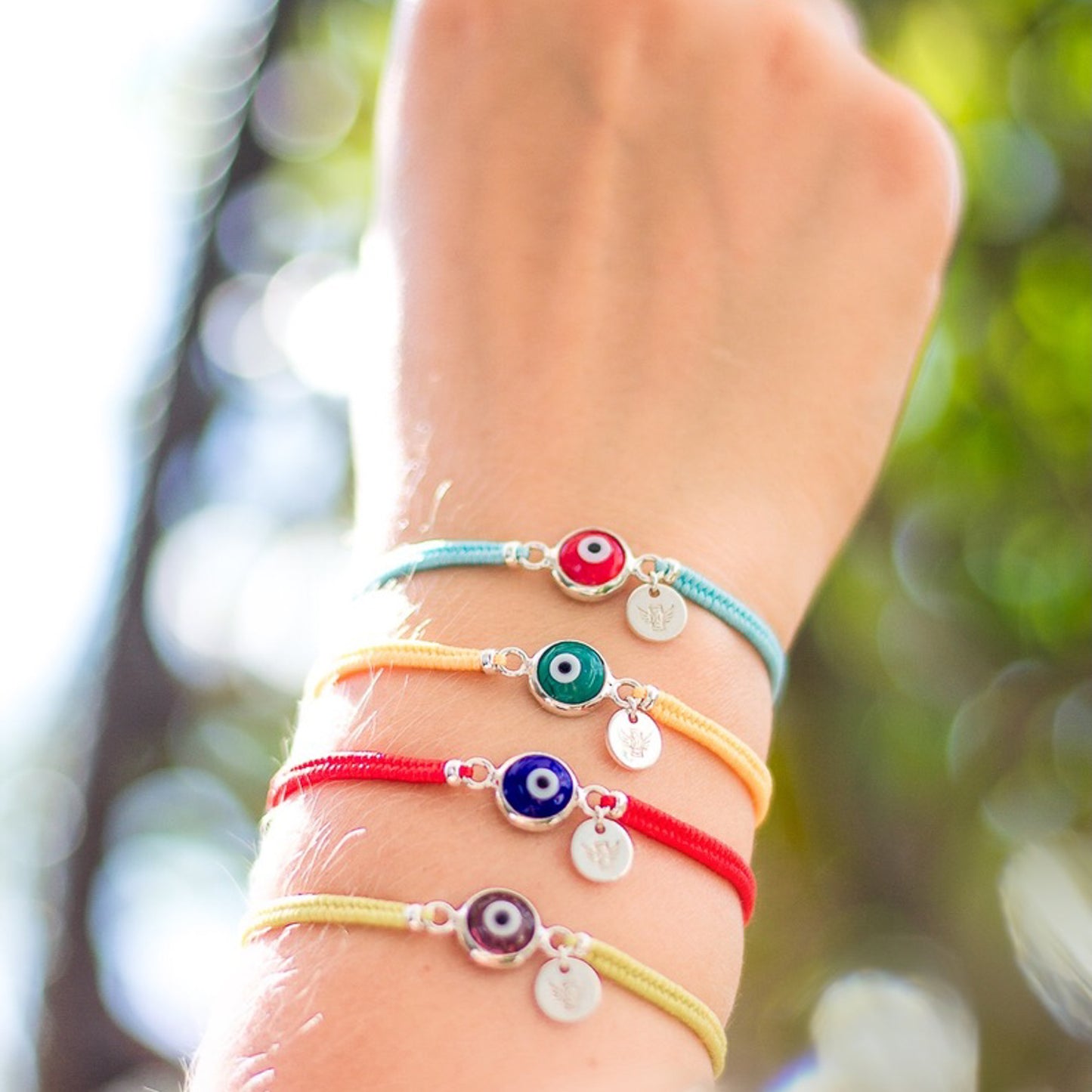 PULSERA TEJIDA SILVER OJO TURCO ROJO