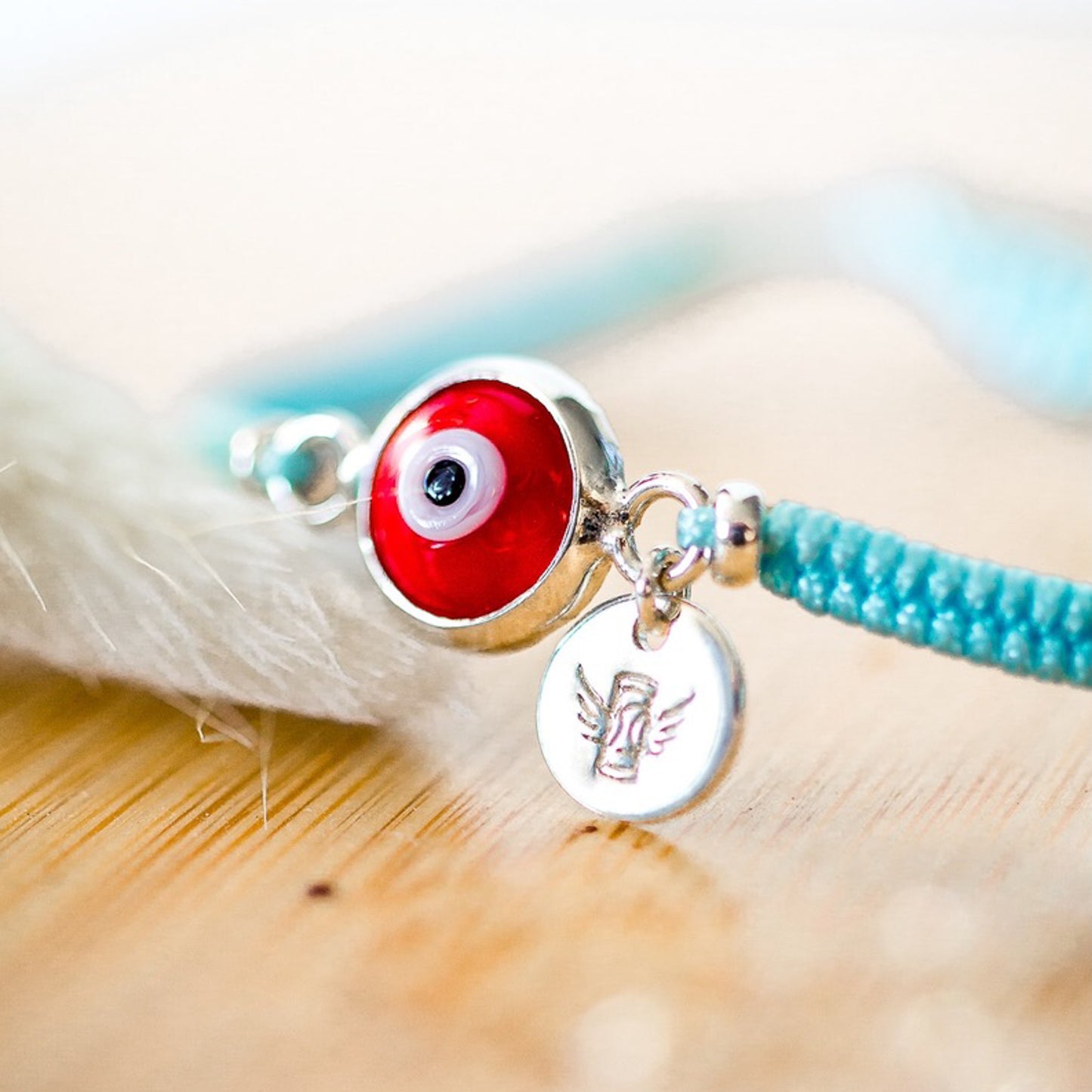 PULSERA TEJIDA SILVER OJO TURCO ROJO